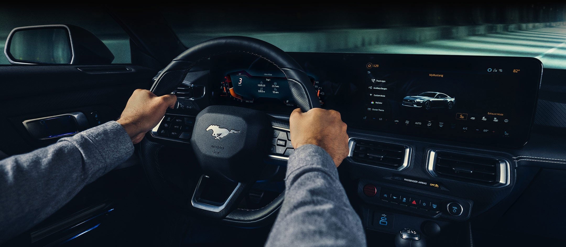 A 2024 Ford Mustang® model interior with a person driving | Plantation Ford in Plantation FL