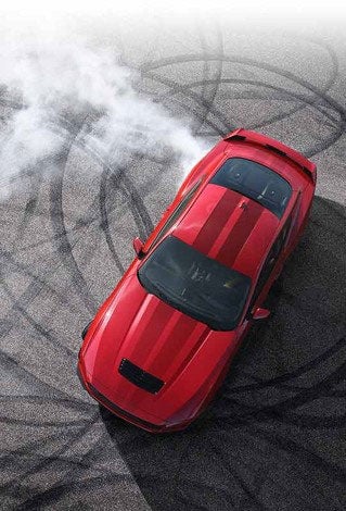 Overhead view of a 2024 Ford Mustang® model with tire tracks on pavement | Plantation Ford in Plantation FL